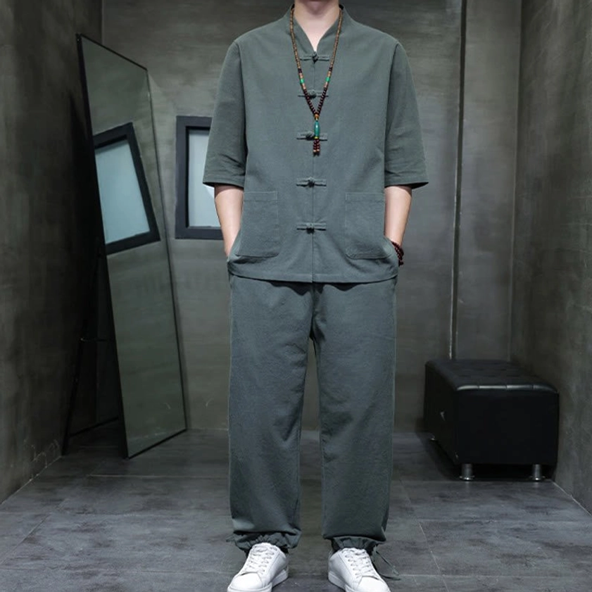 Men's Buddhist meditation cotton linen tang suit set with both hands relaxed at sides, displaying straight loose pants fit