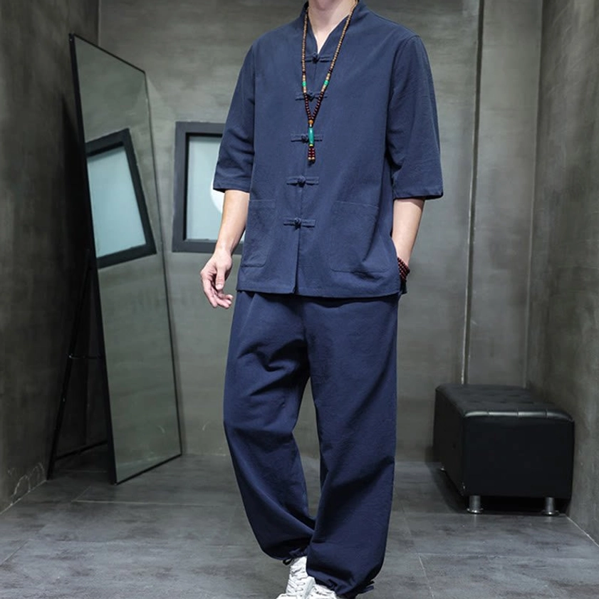 Men's Buddhist meditation cotton linen tang suit set in snow white, front view showing stand collar and relaxed fit