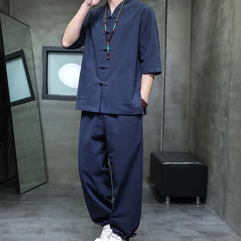 Men's Buddhist meditation cotton linen tang suit set in snow white, hand in pants pocket showing functional design