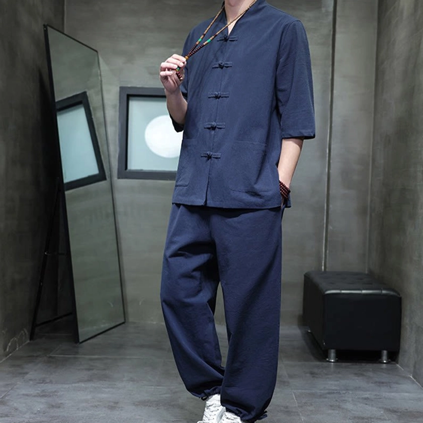 Men's Buddhist meditation cotton linen tang suit set in snow white, top close-up showing frog buttons and stand collar