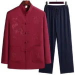 Men's dragon embroidered Tang suit set - front view with maroon top featuring Chinese dragon embroidery and traditional frog buttons, paired with navy blue straight pants