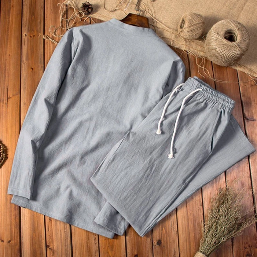 Men's midnight blue cotton-linen meditation clothing set with long sleeves and comfortable fit - wooden surface display
