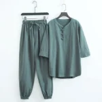 Men's linen Buddhist meditation wear set - dark teal front view with frog button V-neck and elastic waist pants