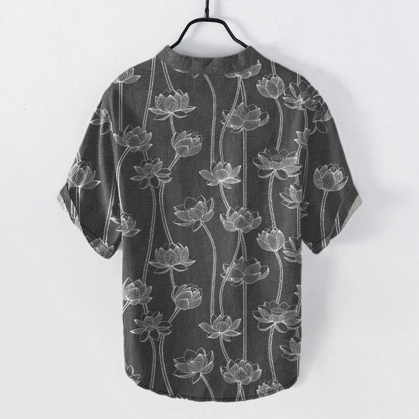 Back view of charcoal grey lotus print henley shirt showing full body spiritual floral pattern and curved hem