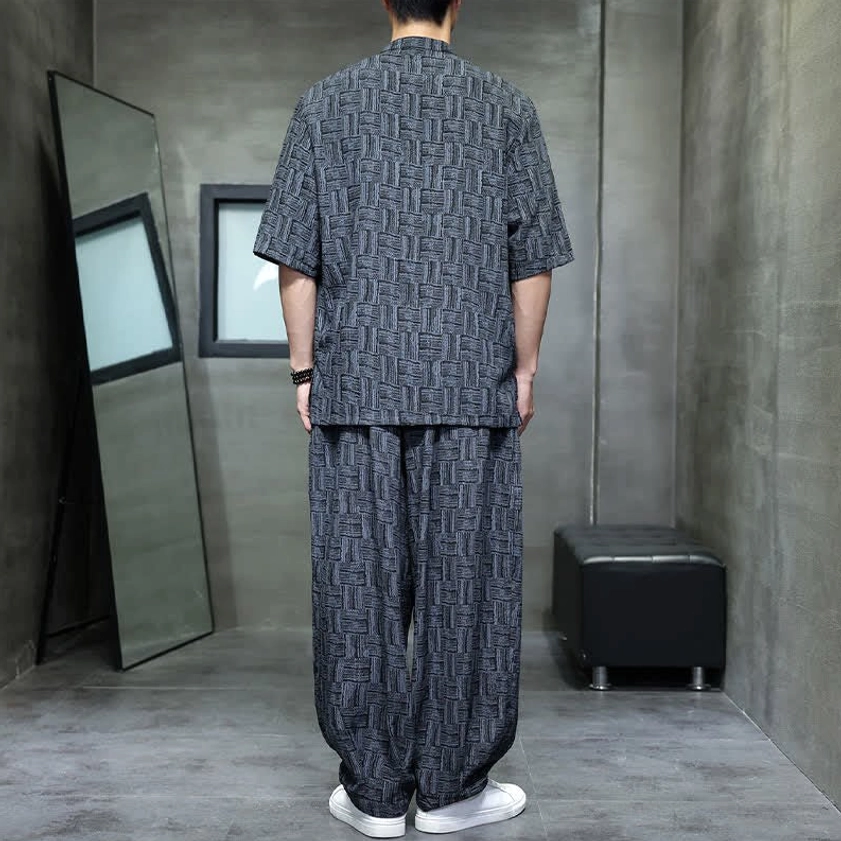 Men's Chinese style mandarin collar shirt set rear view showing geometric printed back design and drawstring harem pants