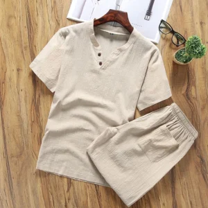 Khaki men's meditation henley t-shirt and shorts set flat lay on wooden table