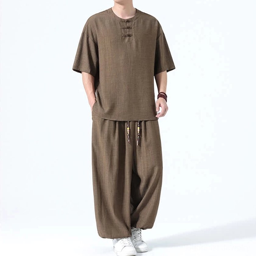 Men's Tang style two-piece set brown right three-quarter hand in pocket showing wide leg harem fit