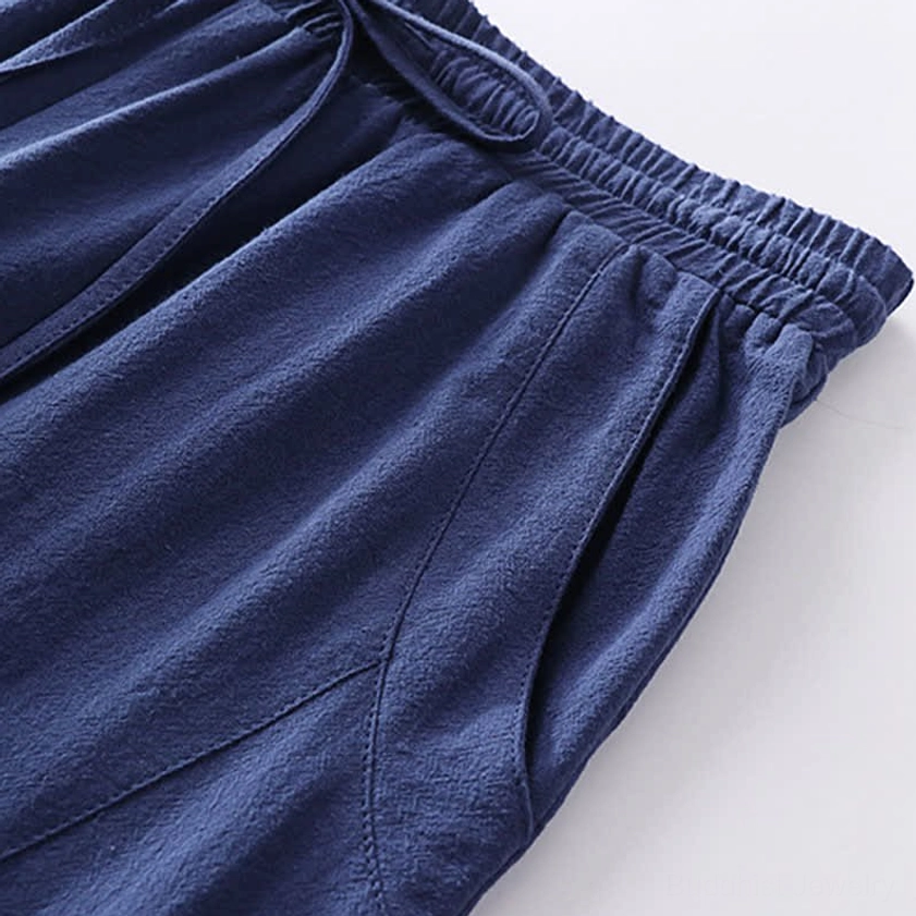 Men's Tang style meditation pants detail showing drawstring adjustment and pocket placement