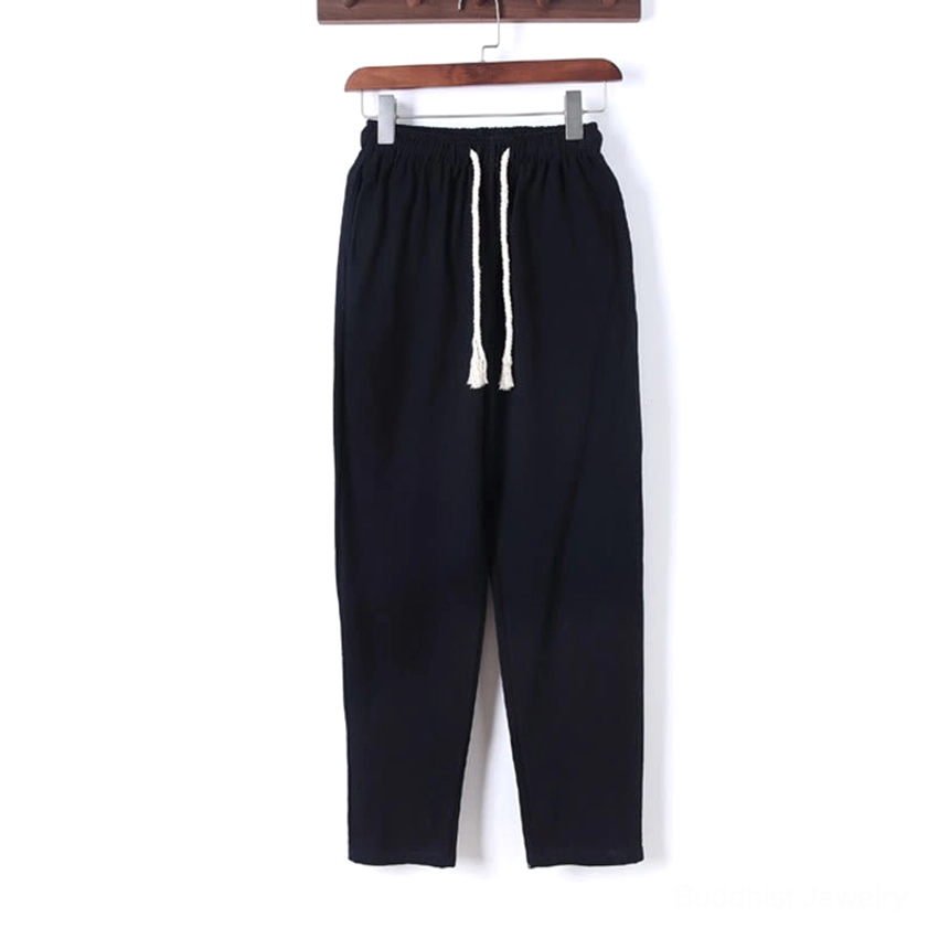 Casual straight leg meditation pants front hanging display with elastic drawstring waist on wooden hanger