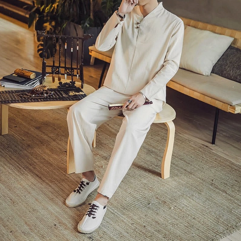 Men's meditation clothing set sitting pose showing comfort and mindfulness wear