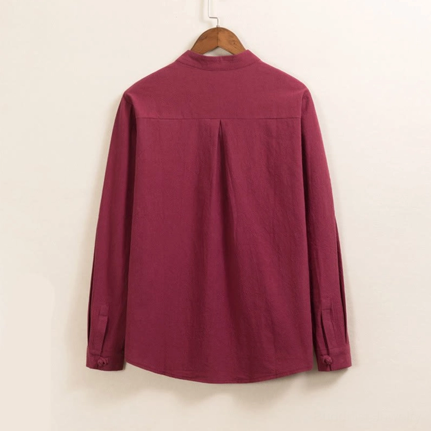 Men's meditation shirt back view with pleat design, burgundy cotton garment, traditional frog button closure