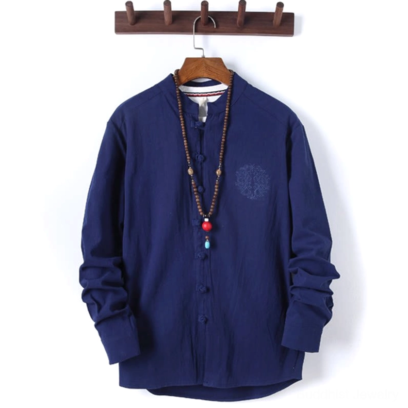 Firebrick red meditation shirt with traditional frog closures, close-up of button detail and fabric texture