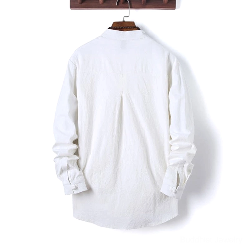 Back view of firebrick red meditation shirt with pleated construction and traditional Eastern design elements