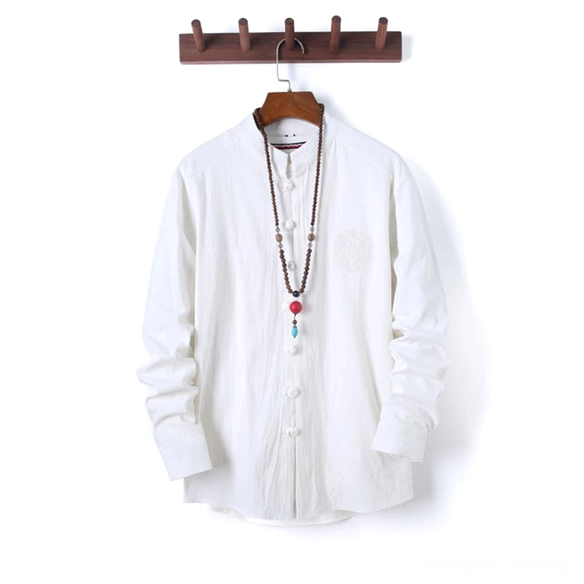 Firebrick red meditation shirt hanging display showing frog button closure and stand collar design