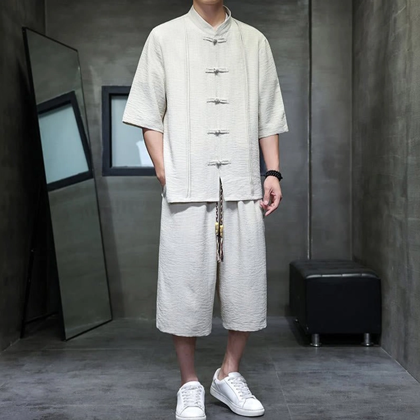 Men's two-piece meditation clothing set with elbow-length sleeves and cropped wide-leg pants