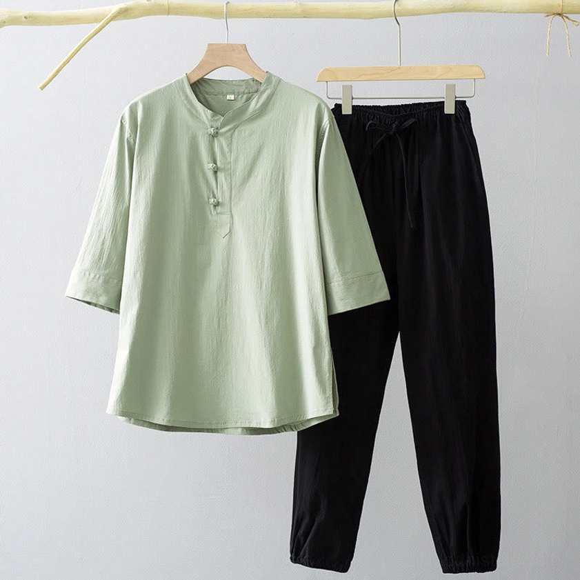 Men's Buddhist meditation suit with sage green shirt and black pants, three-quarter sleeves, traditional frog buttons, spiritual practice wear