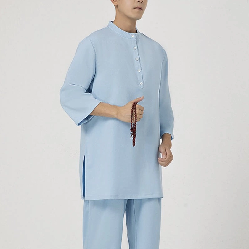 Men's meditation clothing set in light blue, front full-body view with linen texture and stand collar half-placket design