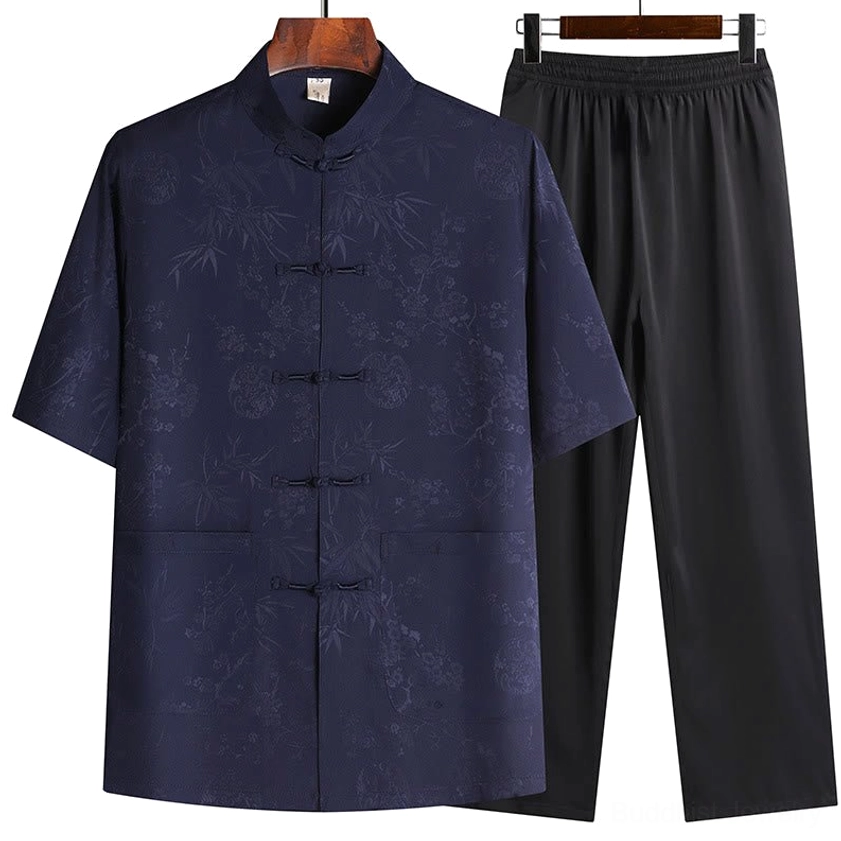 Men's navy blue bamboo pattern tang suit short sleeve top paired with black straight leg pants
