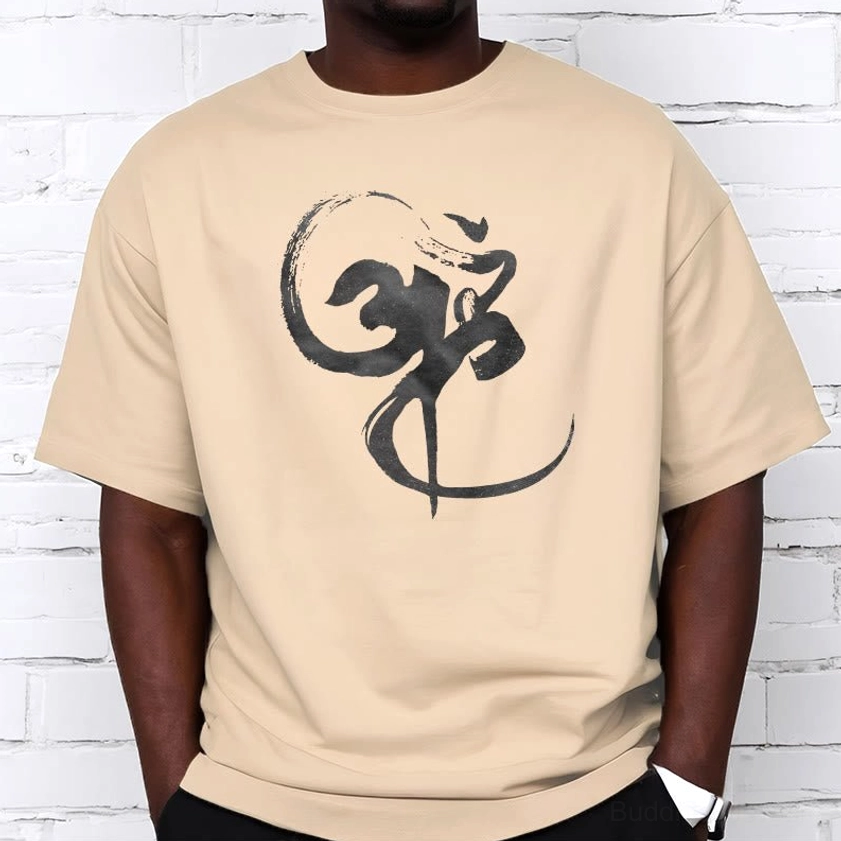 Male wearing light grey Om spiritual t-shirt casual relaxed fit lifestyle photo