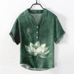 Men's dark green lotus Henley shirt front display - organic cotton with hand-drawn lotus print, stand collar, and half-button placket