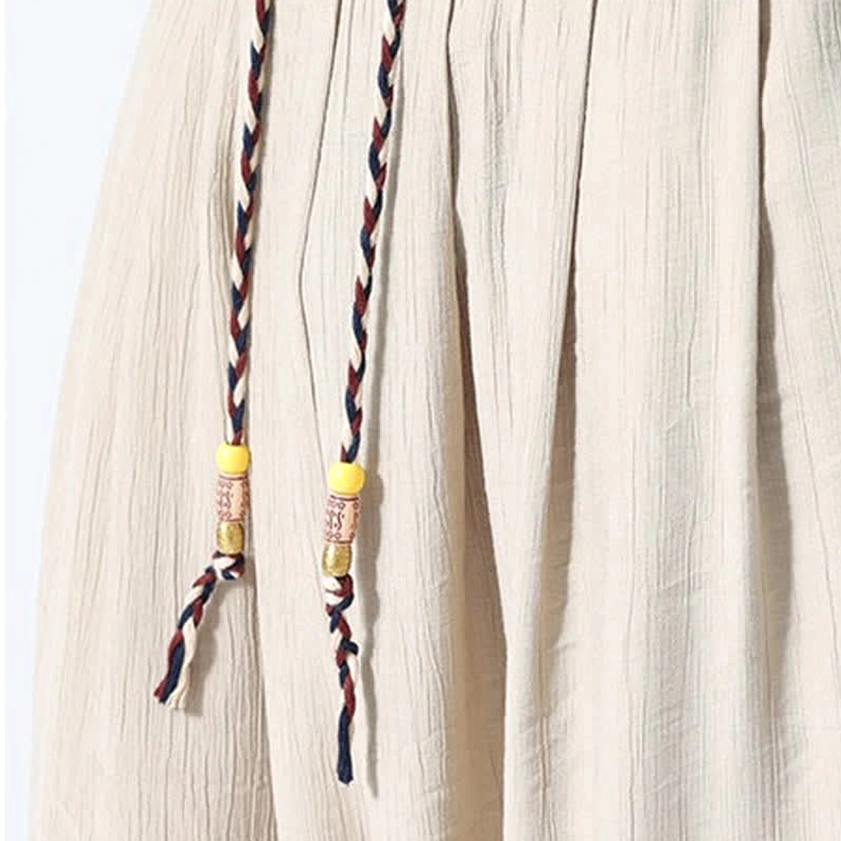 Men's spiritual Buddhism inspired linen set wheat color overall styling shot