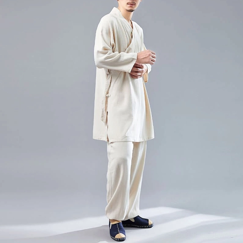 Beige meditation uniform side walking view showing relaxed fit and movement comfort
