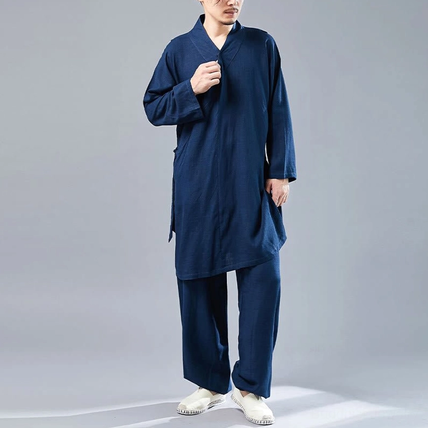 Steel blue uniform sleeve and neckline construction detail showing craftsmanship