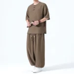 Men's Tang style meditation linen set brown color full body left three-quarter view with frog button shirt and harem pants
