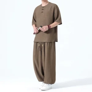 Men's Tang style meditation linen set brown color full body left three-quarter view with frog button shirt and harem pants