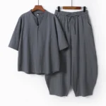 Men's dark gray Tang style meditation two-piece set with stand collar and drawstring cropped pants front view