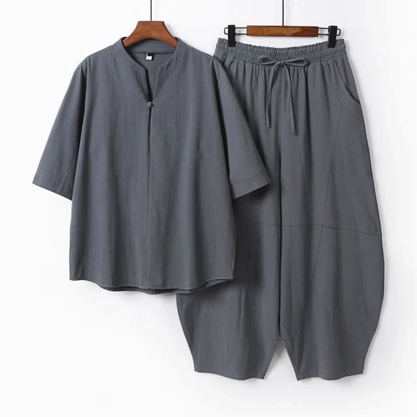 Men's dark gray Tang style meditation two-piece set with stand collar and drawstring cropped pants front view