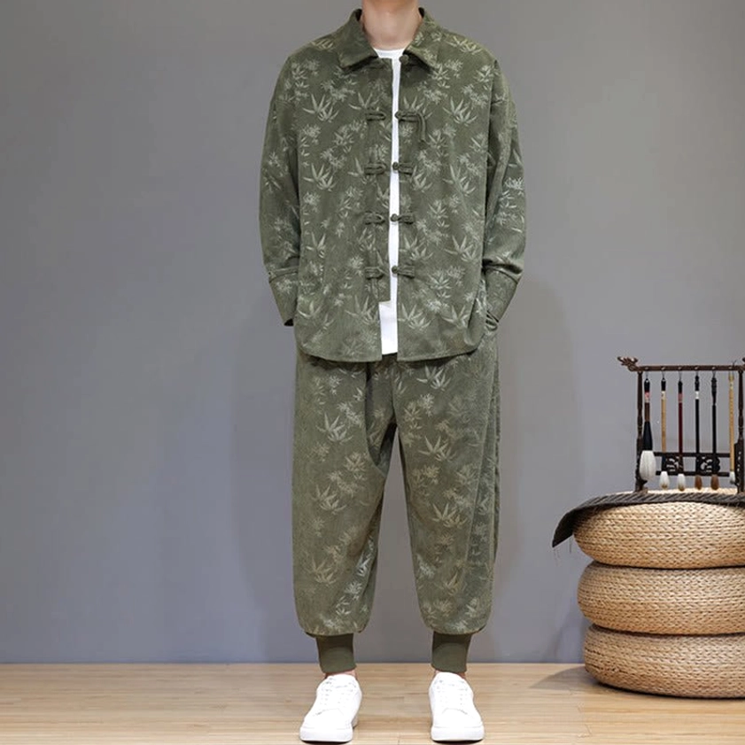 Traditional Chinese tang suit with bamboo leaf print, frontal view showing frog button closure and elastic waistband