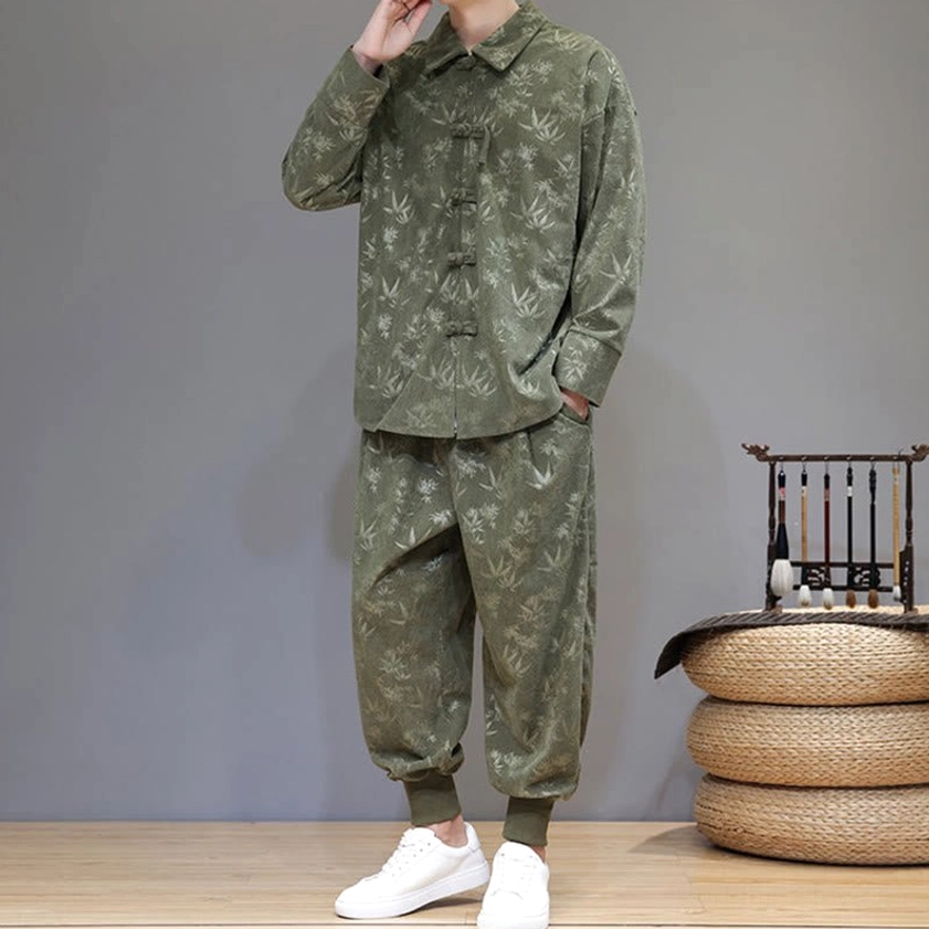 Tang suit three-quarter left view with hand in pocket, showcasing frog button and collar design