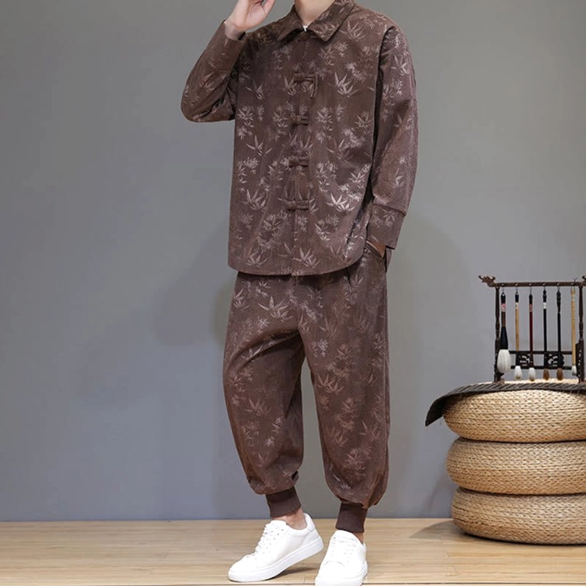 Black tang suit jacket and pants with bamboo leaf pattern, three-quarter angle