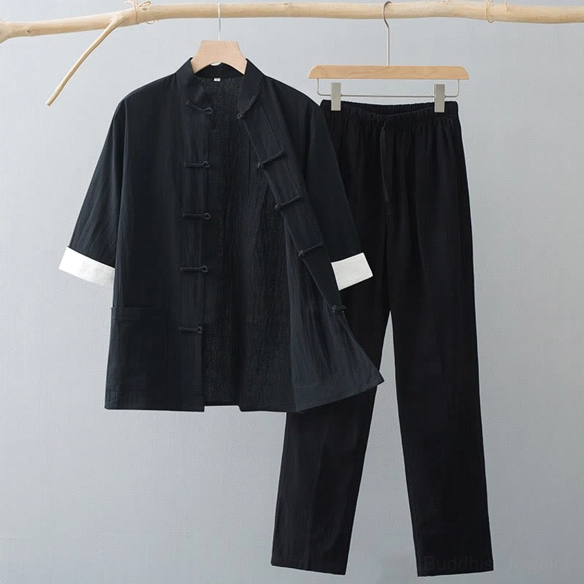 Men's Tang suit in classic black top and black pants with traditional stand collar and frog button closure, multiple size options available