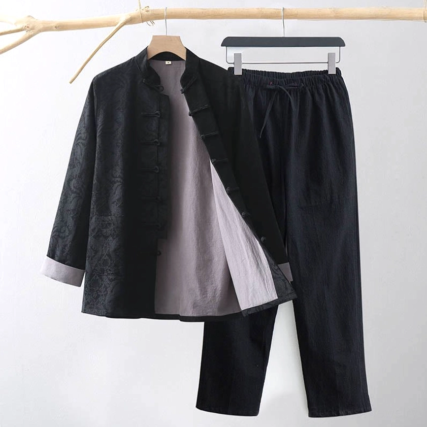 Men's black Tang suit two-piece set with traditional frog buttons - complete jacket and pants ensemble front view