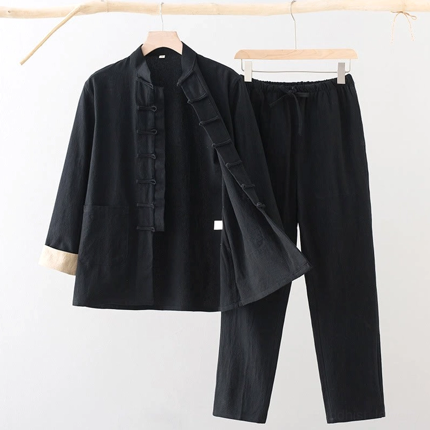 Men's Tang suit two-piece set with black shirt and black pants displaying authentic frog button closure and mandarin collar