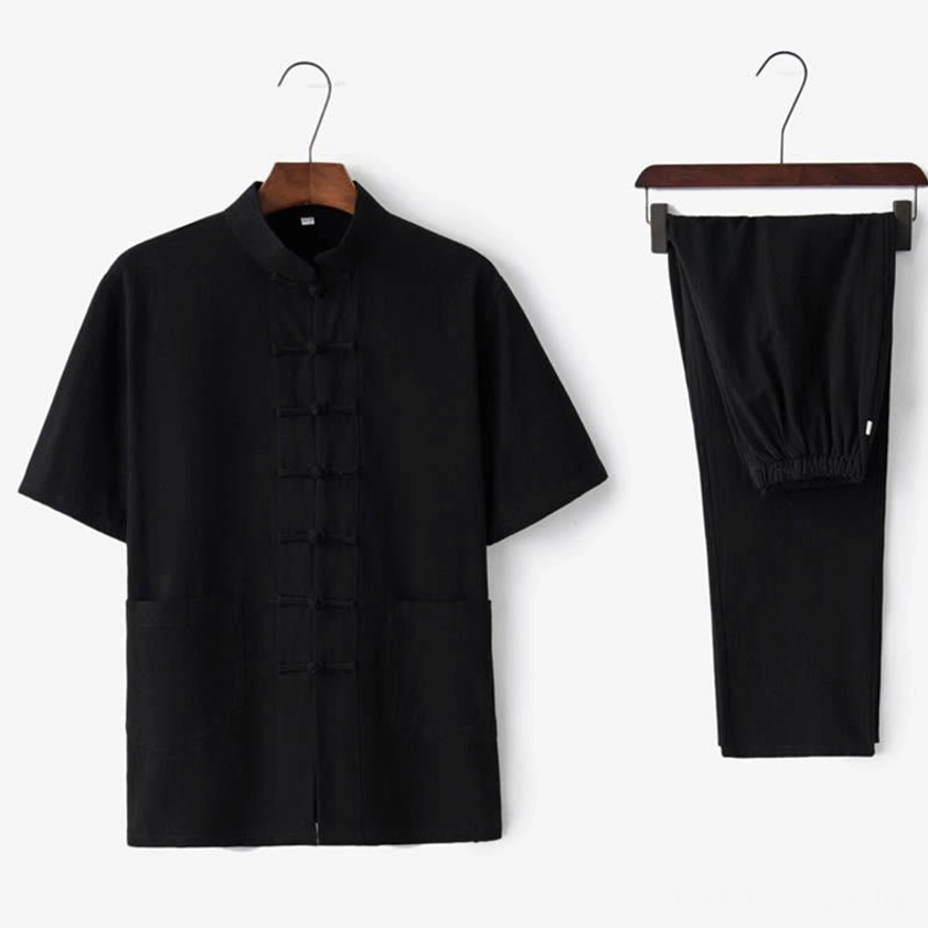 Men's black traditional Tang suit ensemble with frog button front closure and matching pants, classic formal style