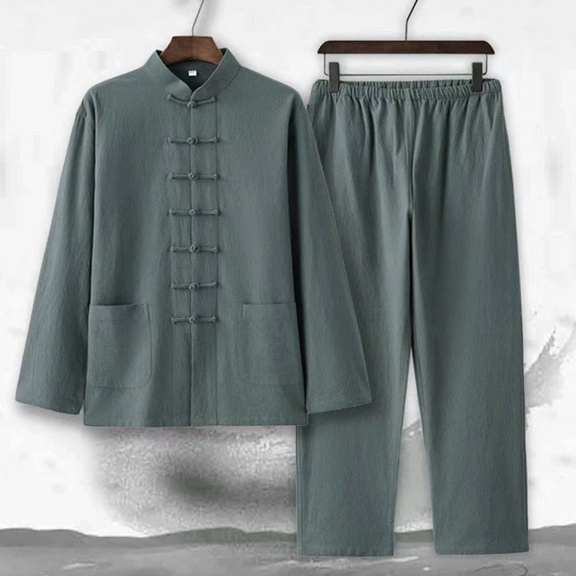 Men's dark green Tang suit with matching straight leg pants, artistic ink wash background display