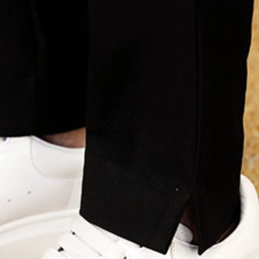 Men's Tang suit set detail shot - decorative embroidery and frog button closure system