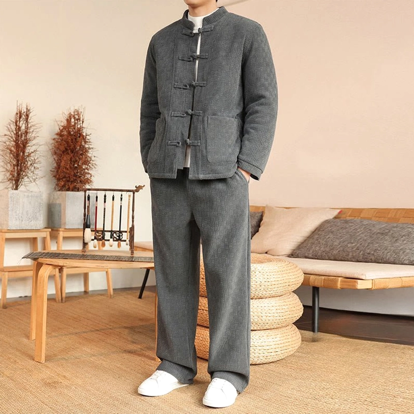 Men's traditional Tang suit jacket and pants set, full front body view with hands in pants pockets and stand collar