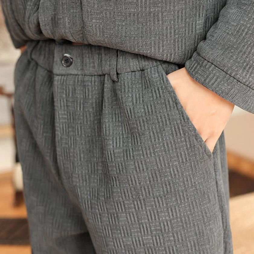 Men's Tang suit two-piece ensemble, front full body angle with straight-cut pants and padded jacket