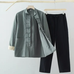 Men's Tang suit two-piece set with gray-green shirt and black pants featuring traditional frog buttons, front view on mannequin