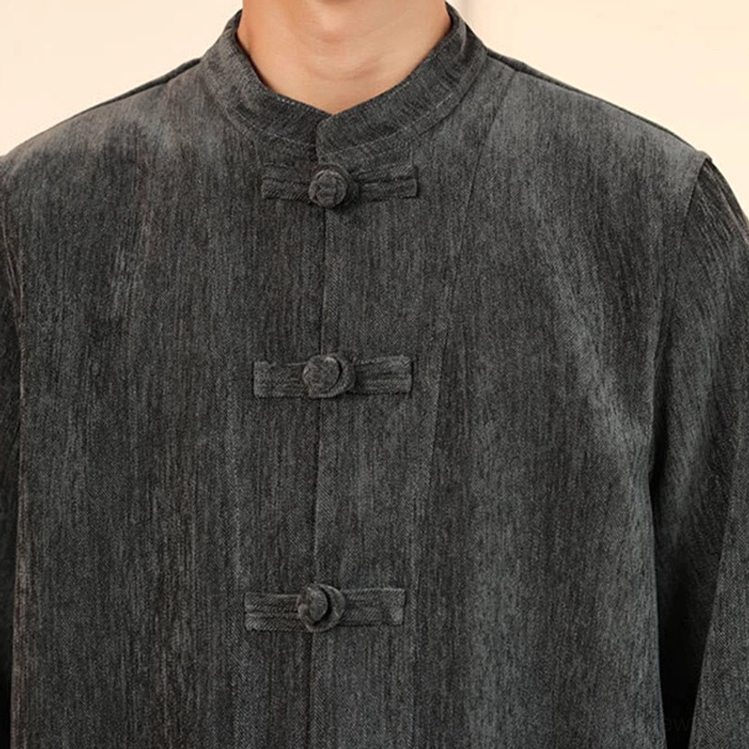 Men's corduroy Tang suit jacket detail with frog button closure and stand collar