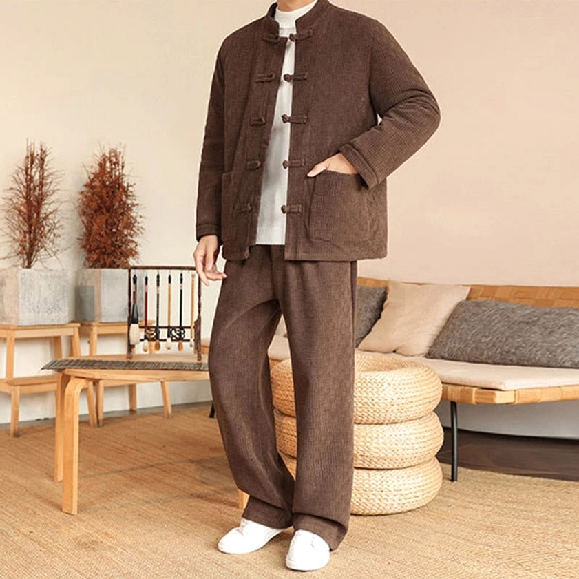 Men's traditional Tang suit two-piece, front view detail of patch pockets and button design elements