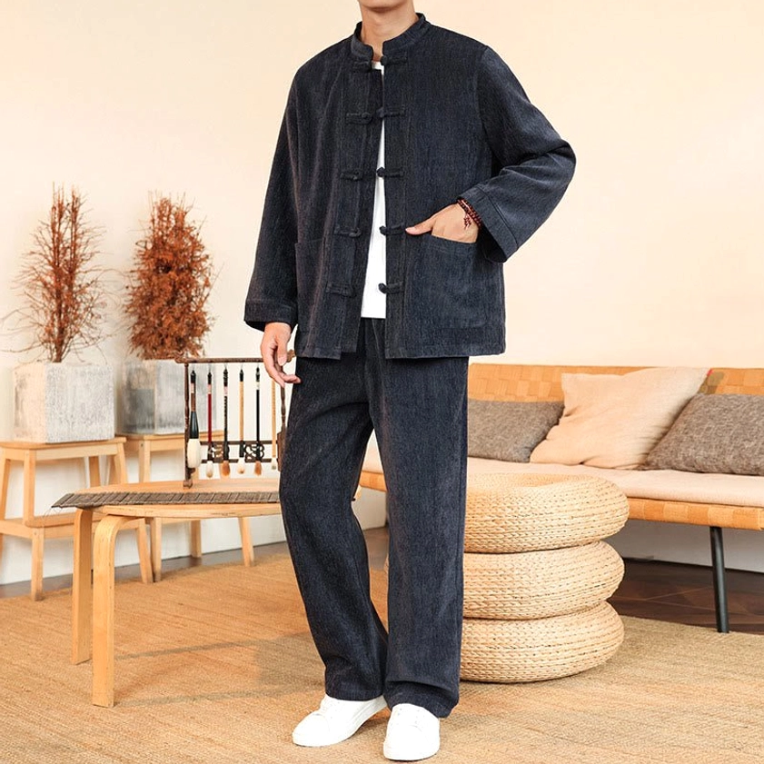 Men's Tang suit jacket and pants three-quarter side view showcasing pocket design and frog button detail