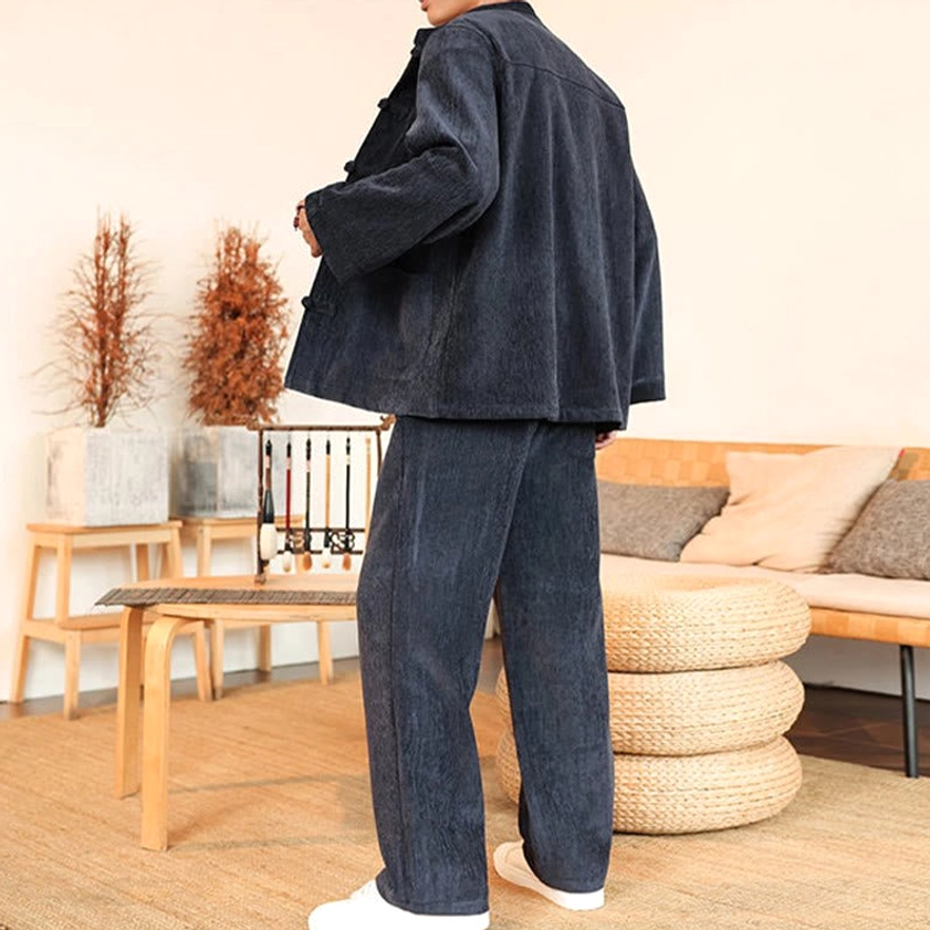 Men's corduroy Tang suit upper body detail with stand collar and frog closures