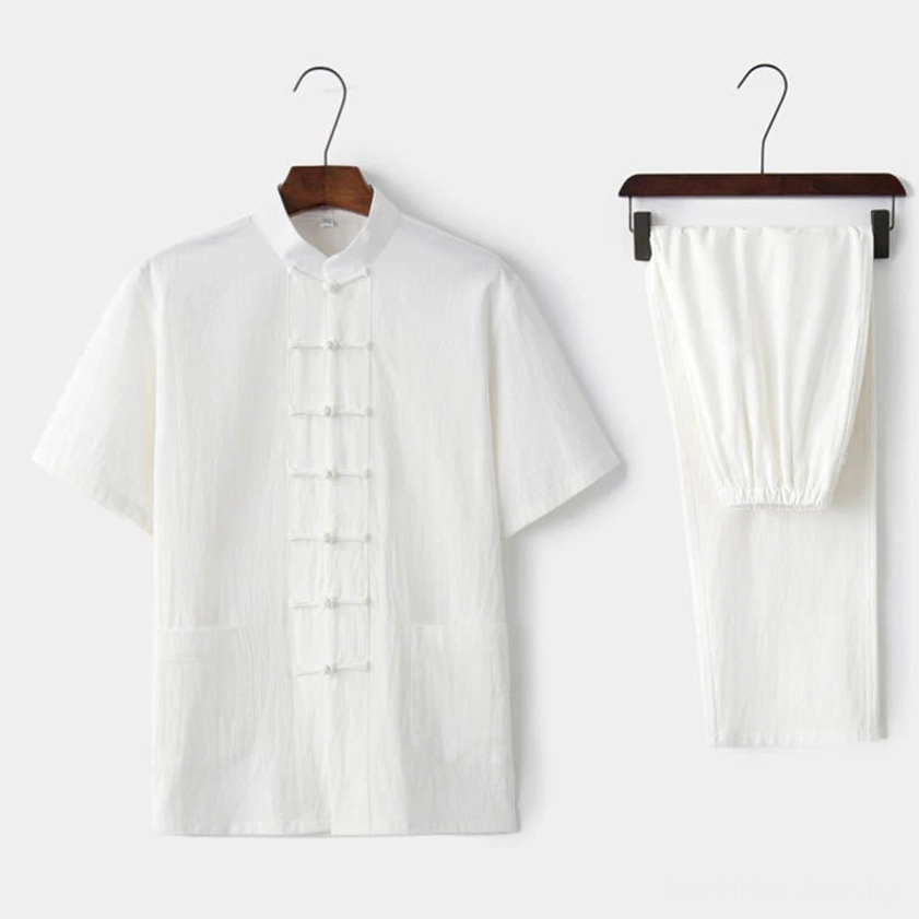 Men's white traditional Tang suit two-piece set with frog buttons and mandarin collar, elegant formal wear on display