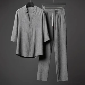 Men's textured stand collar shirt and pants two-piece set, front flat lay display showing gray fabric with wrinkled texture and elastic waist pants
