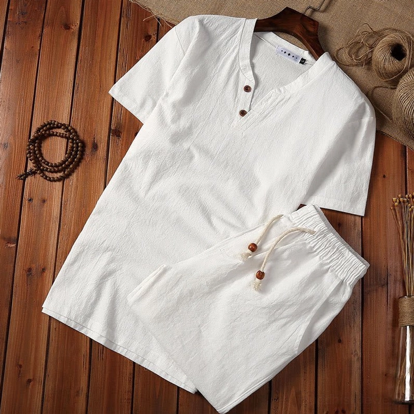 White cotton linen two-piece meditation set for men with henley collar, overhead flat lay view